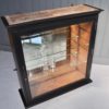 Ebonised glazed cabinet