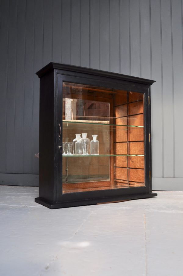 Ebonised glazed cabinet