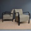 Pair of ebonised French chairs