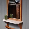 mirror with marble shelf