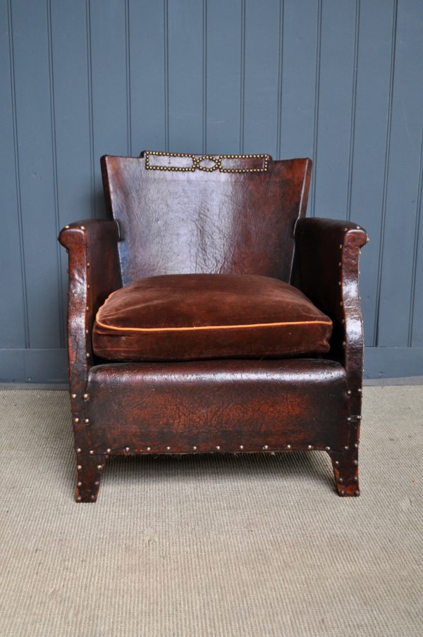 Petite leather armchair