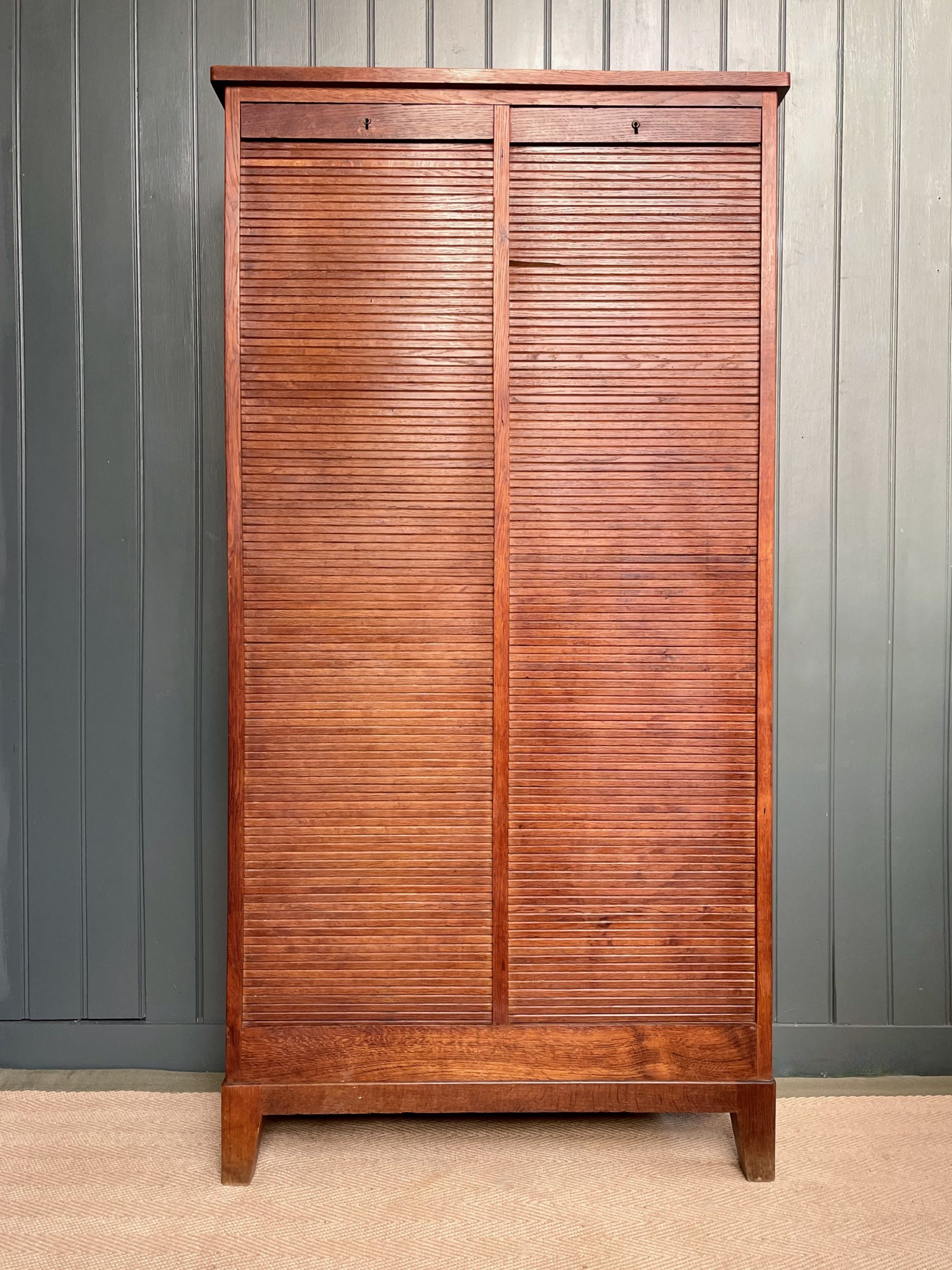 oak tambour cabinet