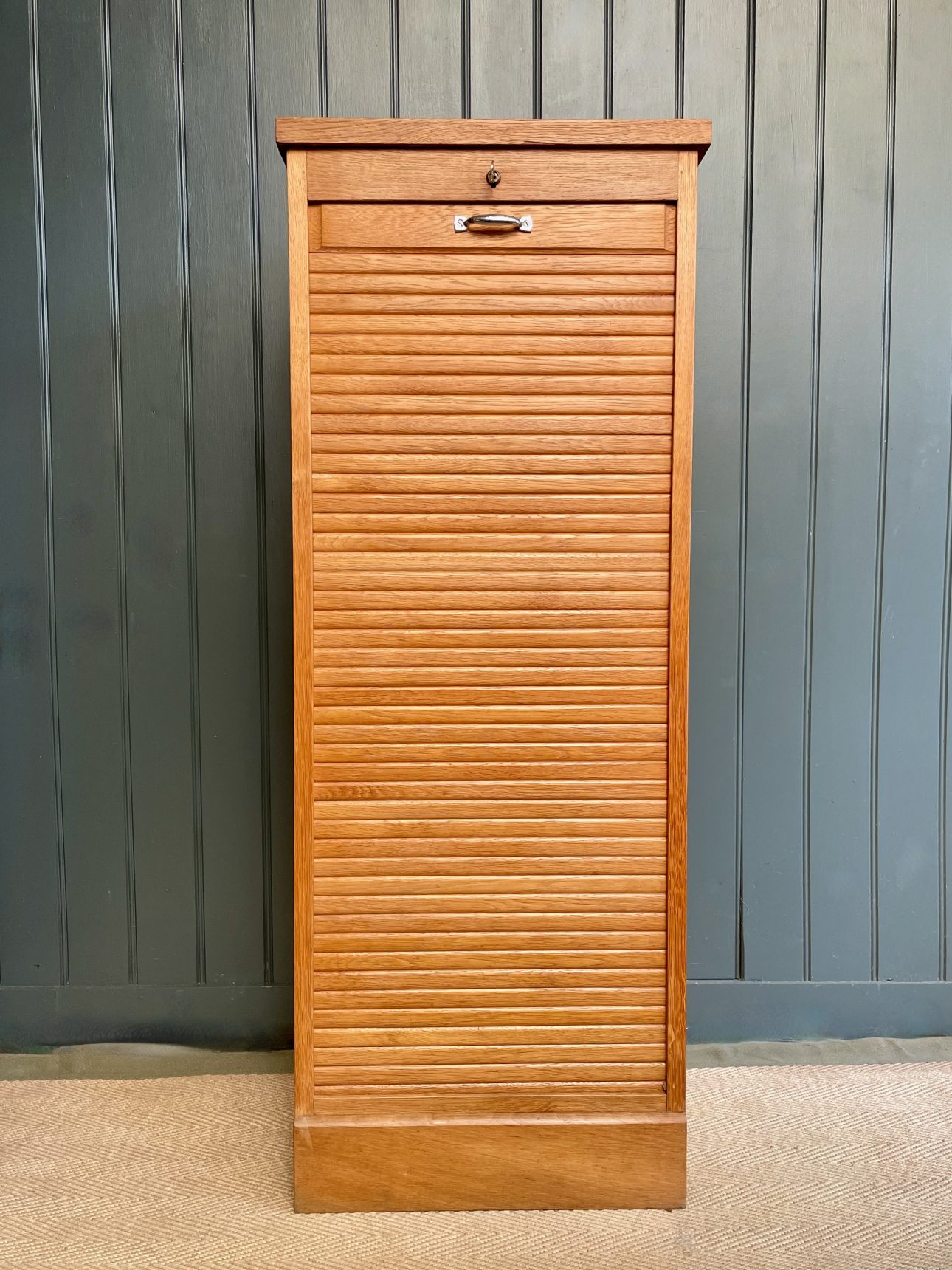 Single tambour cabinet
